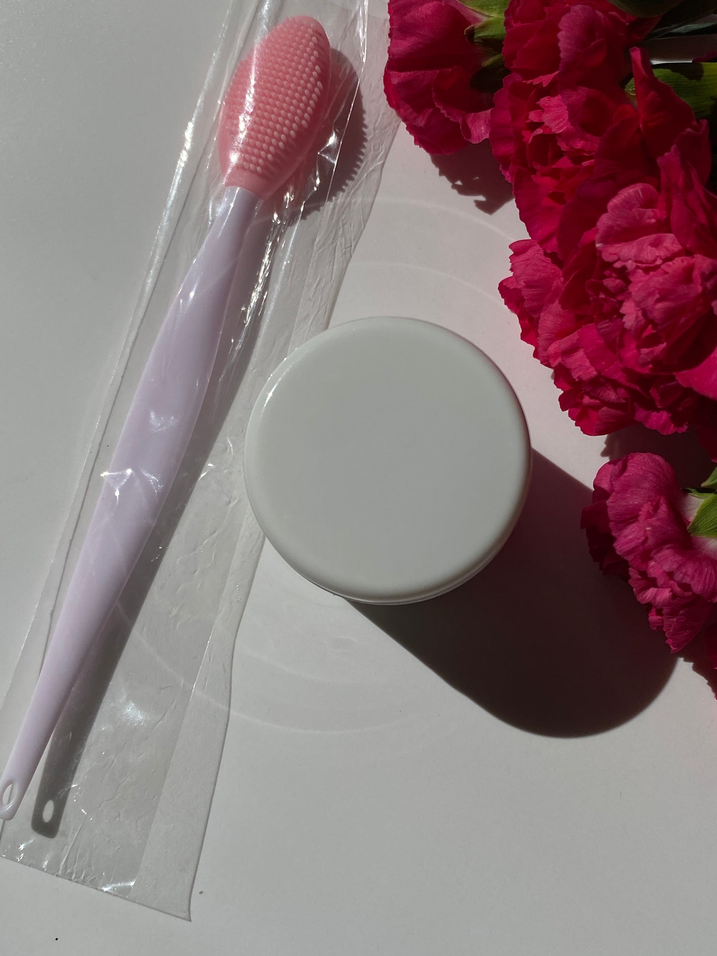 Lip balm and lip exfoliating brush. Lip care set